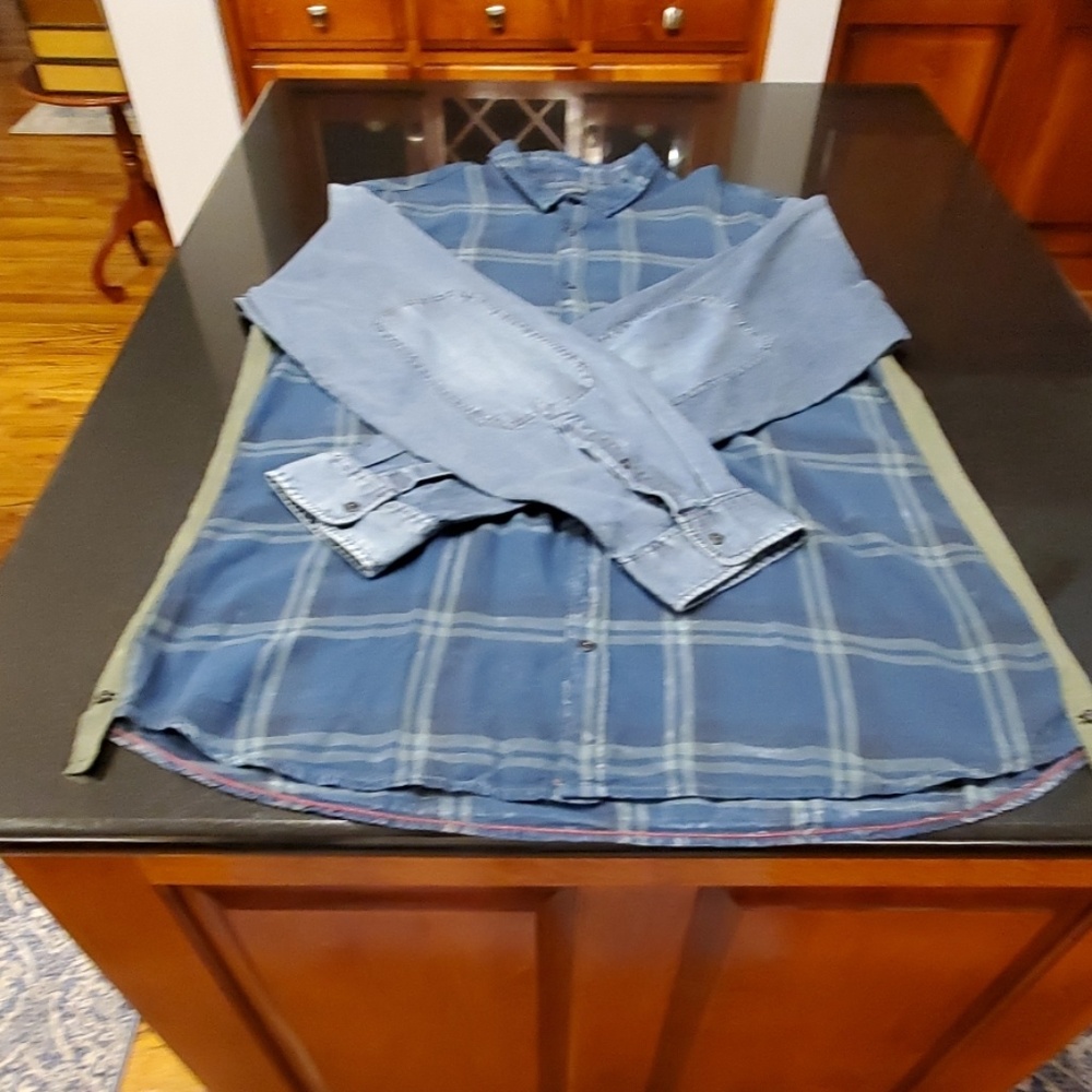 Blue denim cotton shirt. Weathered look.